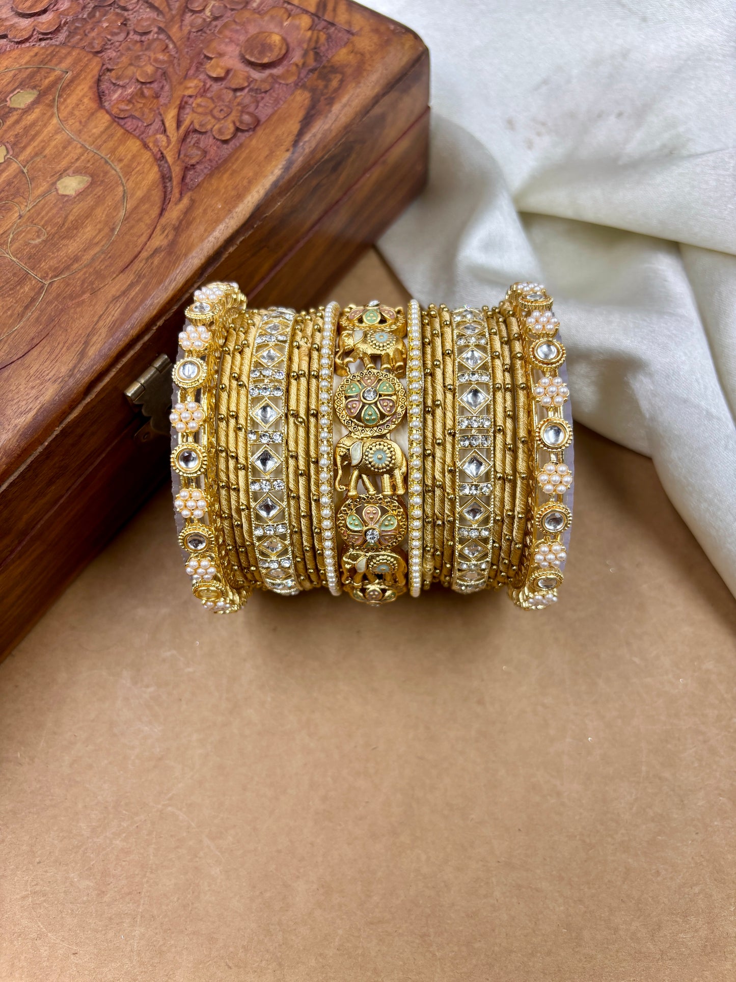 Designer Gold Silk Thread Bangles Set