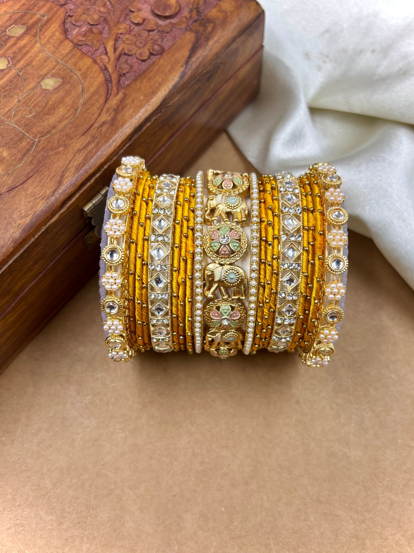 Designer Yellow Silk Thread Bangles Set