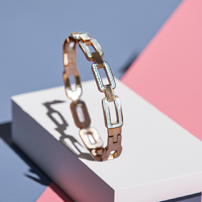 Gold bracelet with diamond accents on a geometric background by hitesh bangles