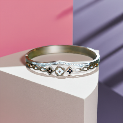 Silver ring with intricate designs on a geometric background by hitesh bangles