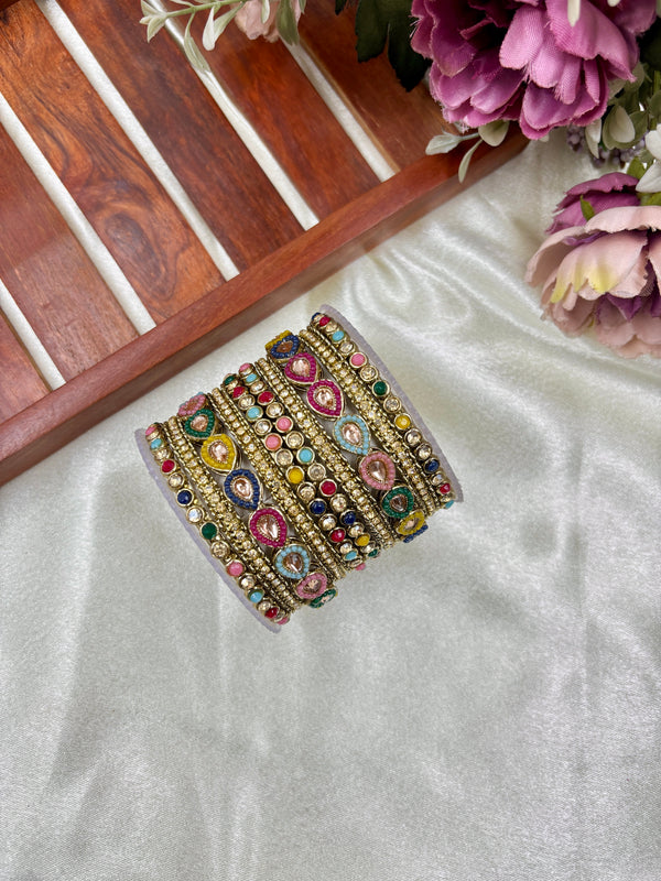 Multi-Shade Elegance: Hitesh Bangles with Vibrant Gemstones and Intricate Detailing