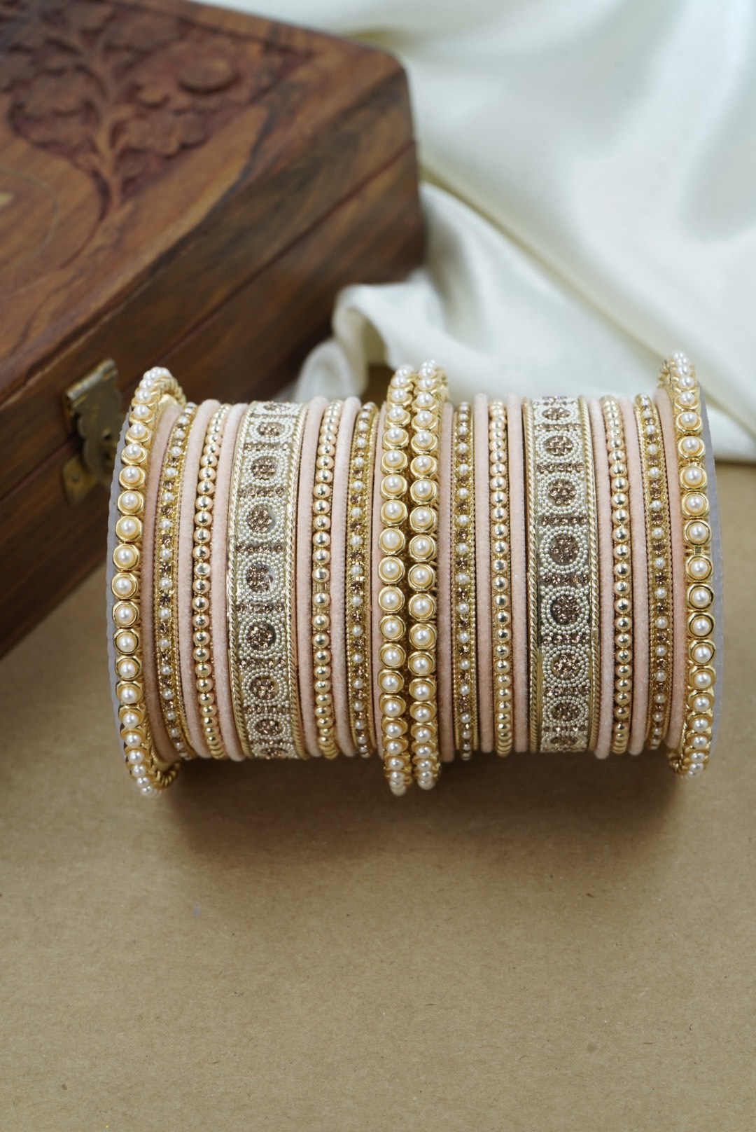 Decorative bangles on a wooden surface by hitesh bangles