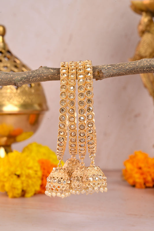Set of gold bridal bangles adorned with round mirror Kundan stones  by hitesh bangles