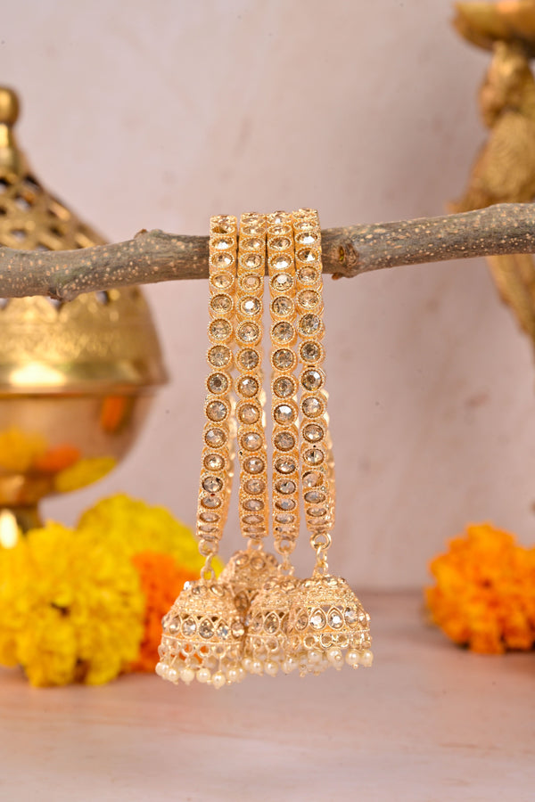 Set of gold bridal bangles adorned with round mirror Kundan stones 