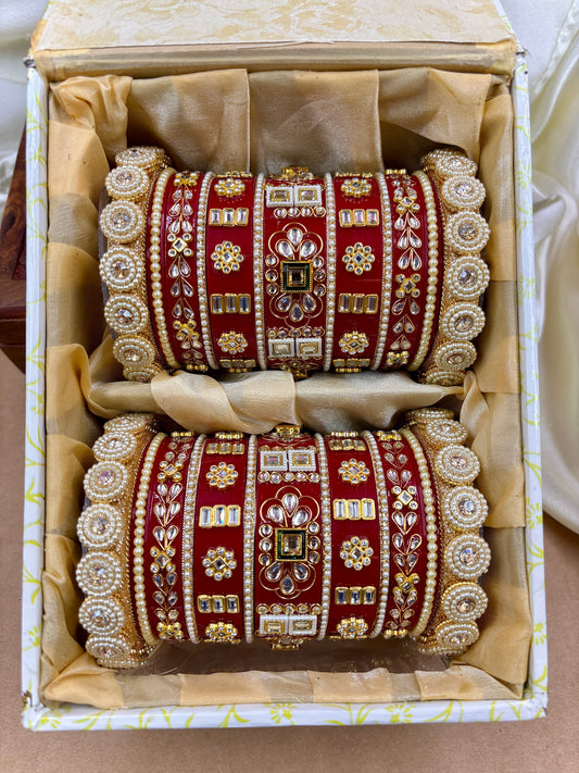 Set of red and gold bangles in a decorative box by hitesh bangles