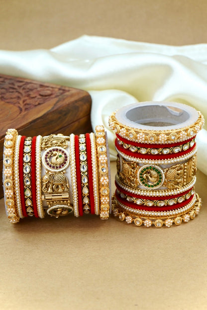 Decorative bangles with intricate designs on a beige surface by hitesh bangles